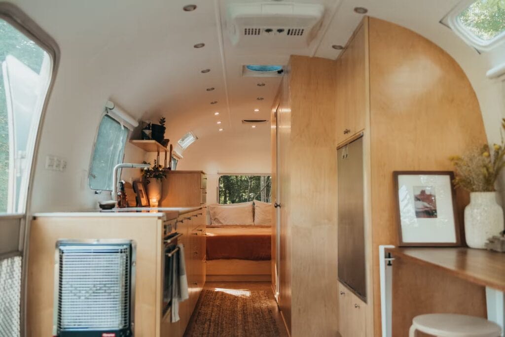 An image of the interior of a modern and well-appointed airstream trailer